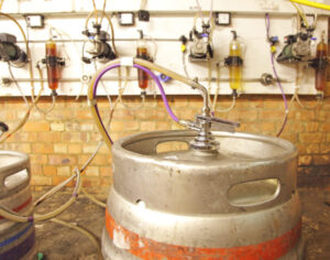 kegs of beer in a cellar